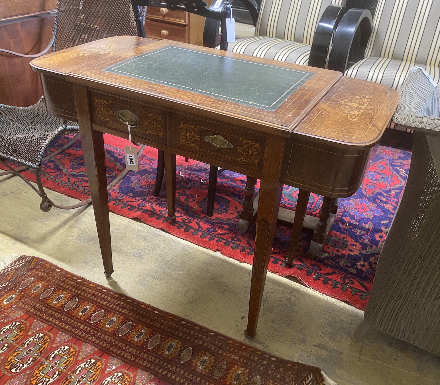 A late Victorian inlaid rosewood writing table, width 94cm, depth 45cm, height 72cm